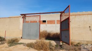 Propiedad en Caspe junto al embalse del Civán. para vender con corral por 70.000€